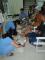 12-20090812-救災團隊協助受傷民眾包紮傷口-後送新發傷患至六龜衛生所處理傷口.JPG